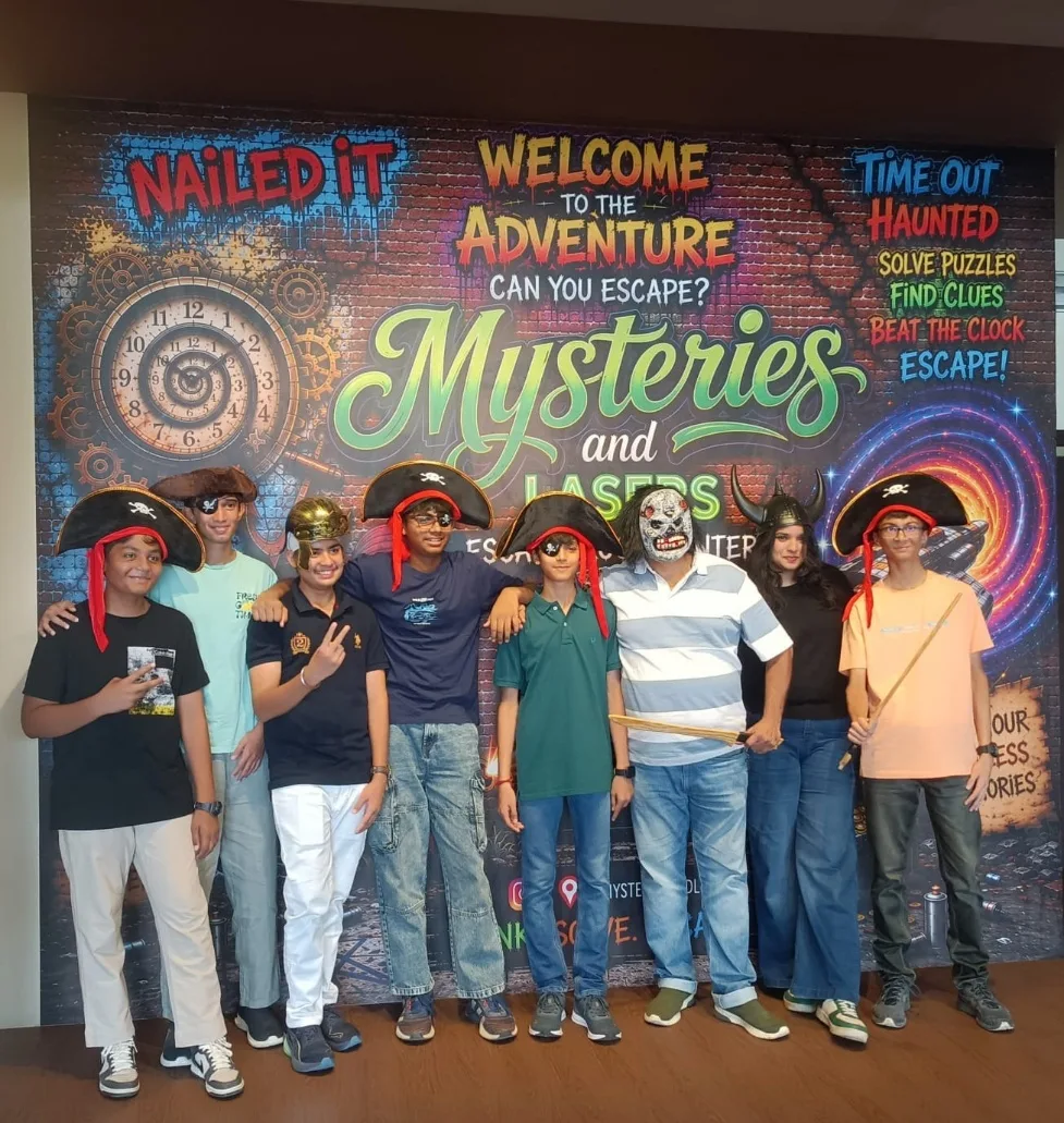 A group of friends celebrating at the Bellandur mural