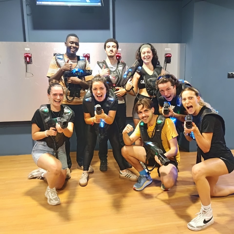 Friends celebrating together after a Laser Tag round at Mysteries and Lasers Bengaluru